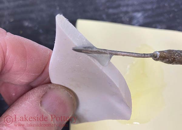 Apply adhesive in very thin layers