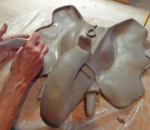 Hand building pottery lessons