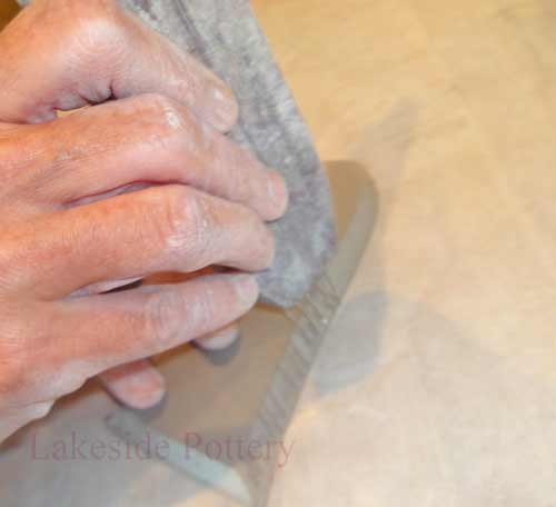 score clay edges for proper joining