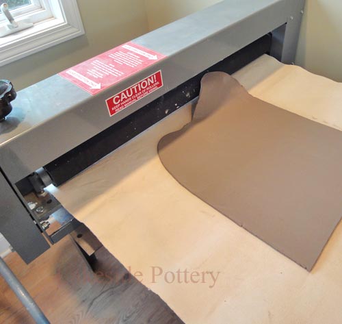 Flatten clay to a 1/4" slab