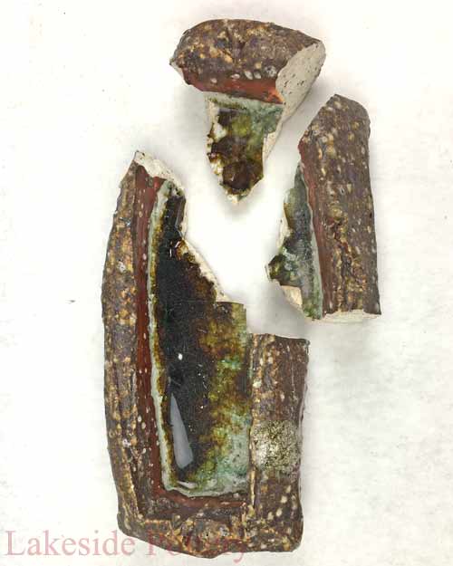 Broken ceramic candle holder