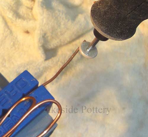 Grind wire's surface