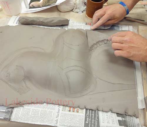 cut off the unneeded clay