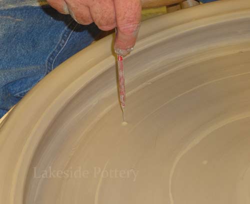 verify bottom's thickness with a pin tool