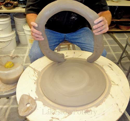 Place coil over pot's base